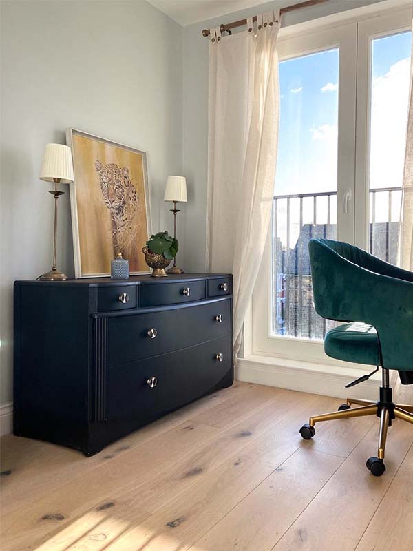 white office space with light wood flooring 