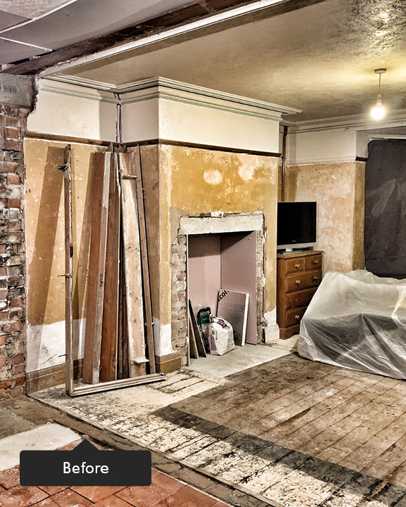 Open plan dining room in renovation with exposed walls and floors